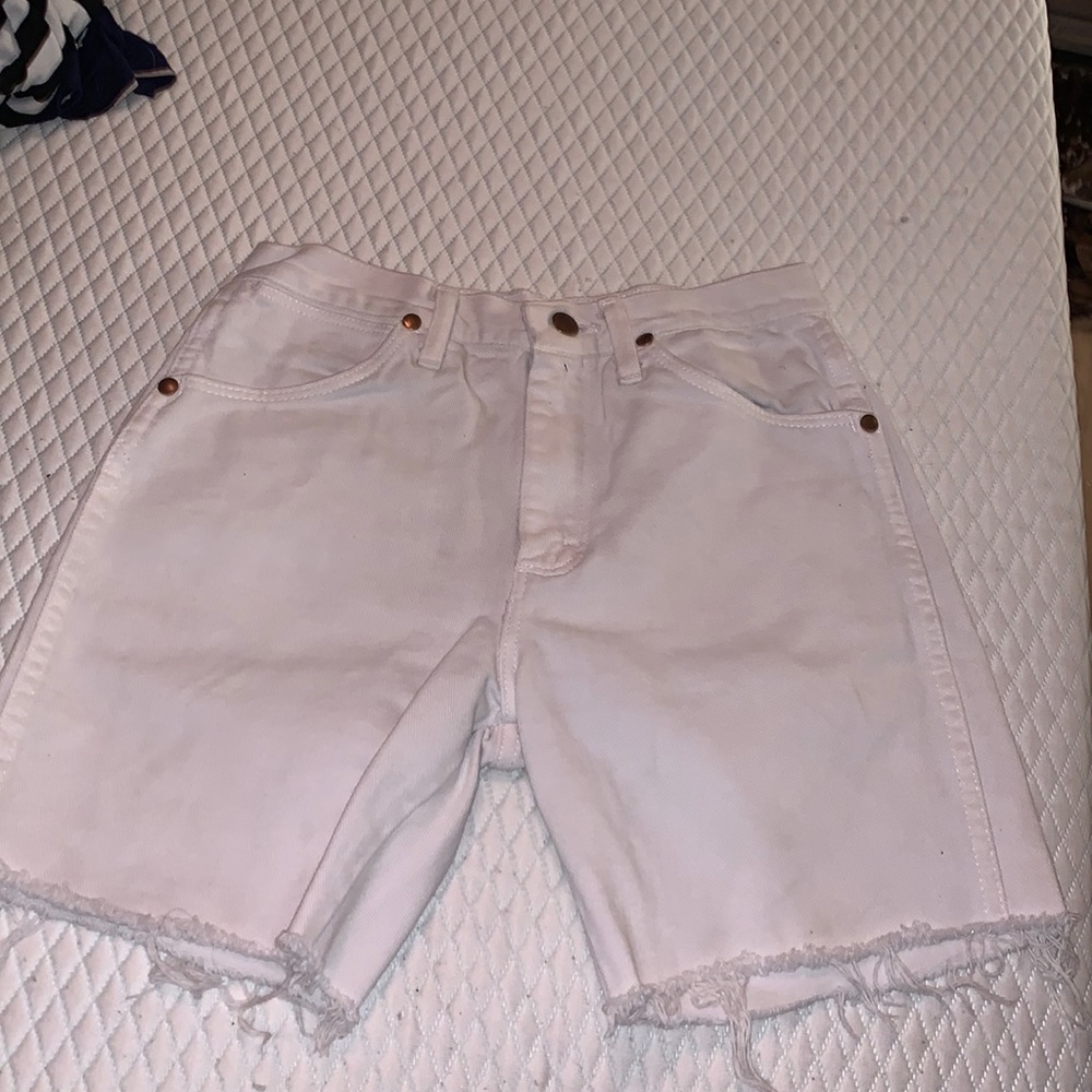 white cut off wrangler shorts